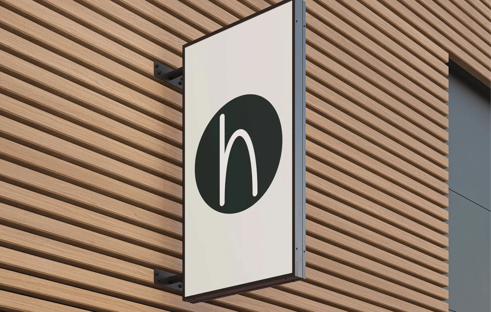 Rótulo de fachada con la «h» de Here